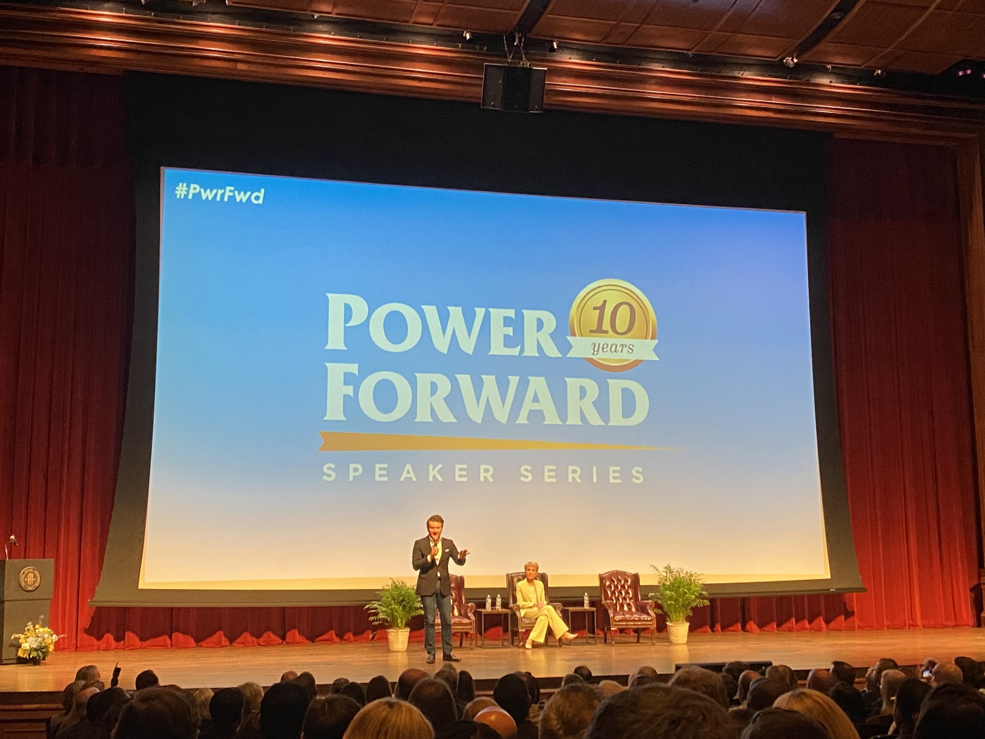 Image of Robert Herjavec and Barbara Corcoran on stage speaking to audience at Power Forward Speker Series.